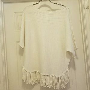 Beige and gold shirt with fringe at the bottom